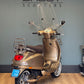 Vespa LX touring 2013 goud perseo