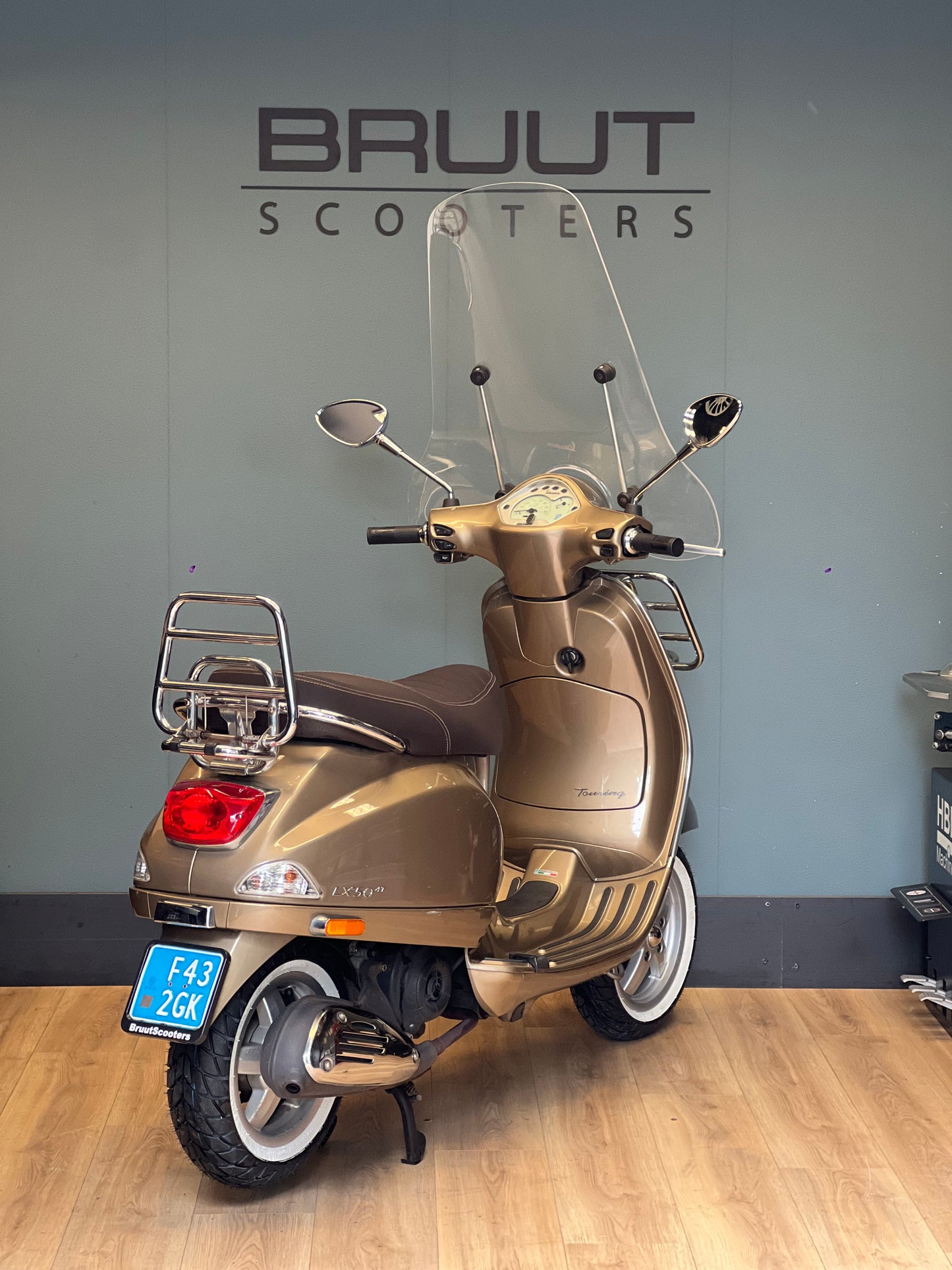 Vespa LX touring 2013 goud perseo